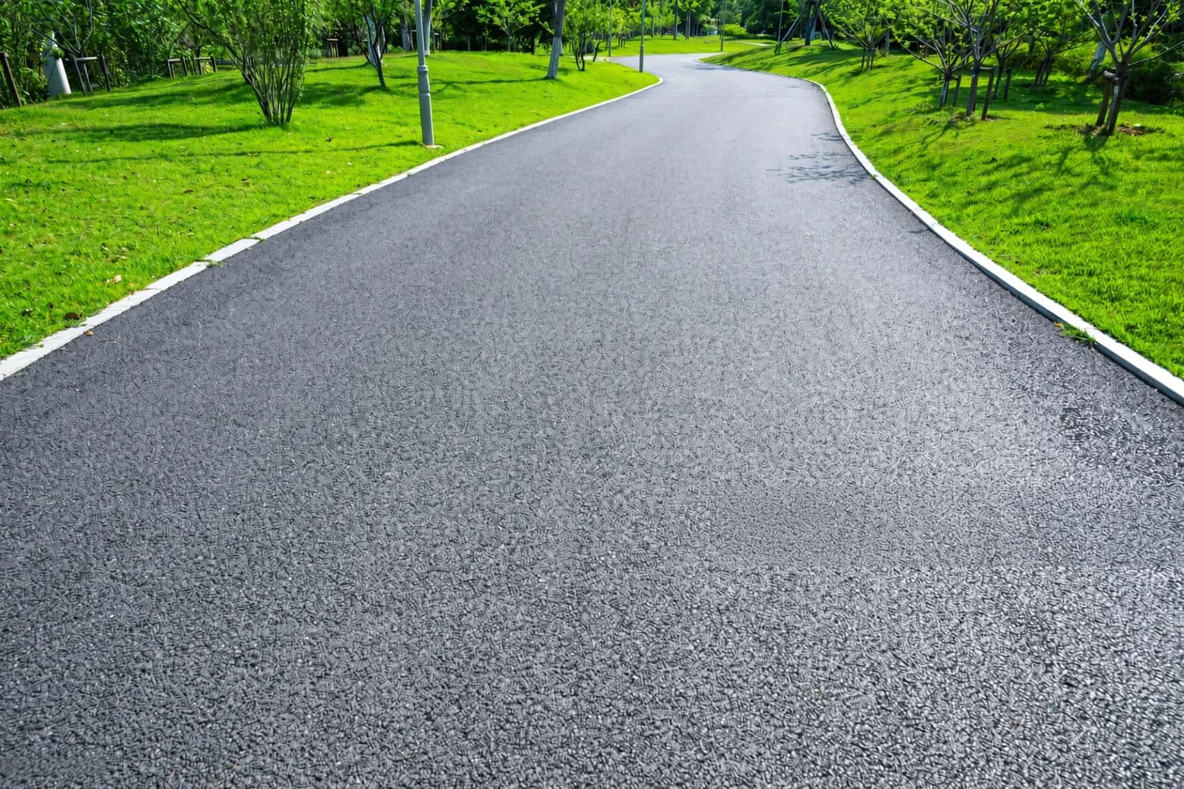 Long asphalt private lane paved on acreage near Plano TX