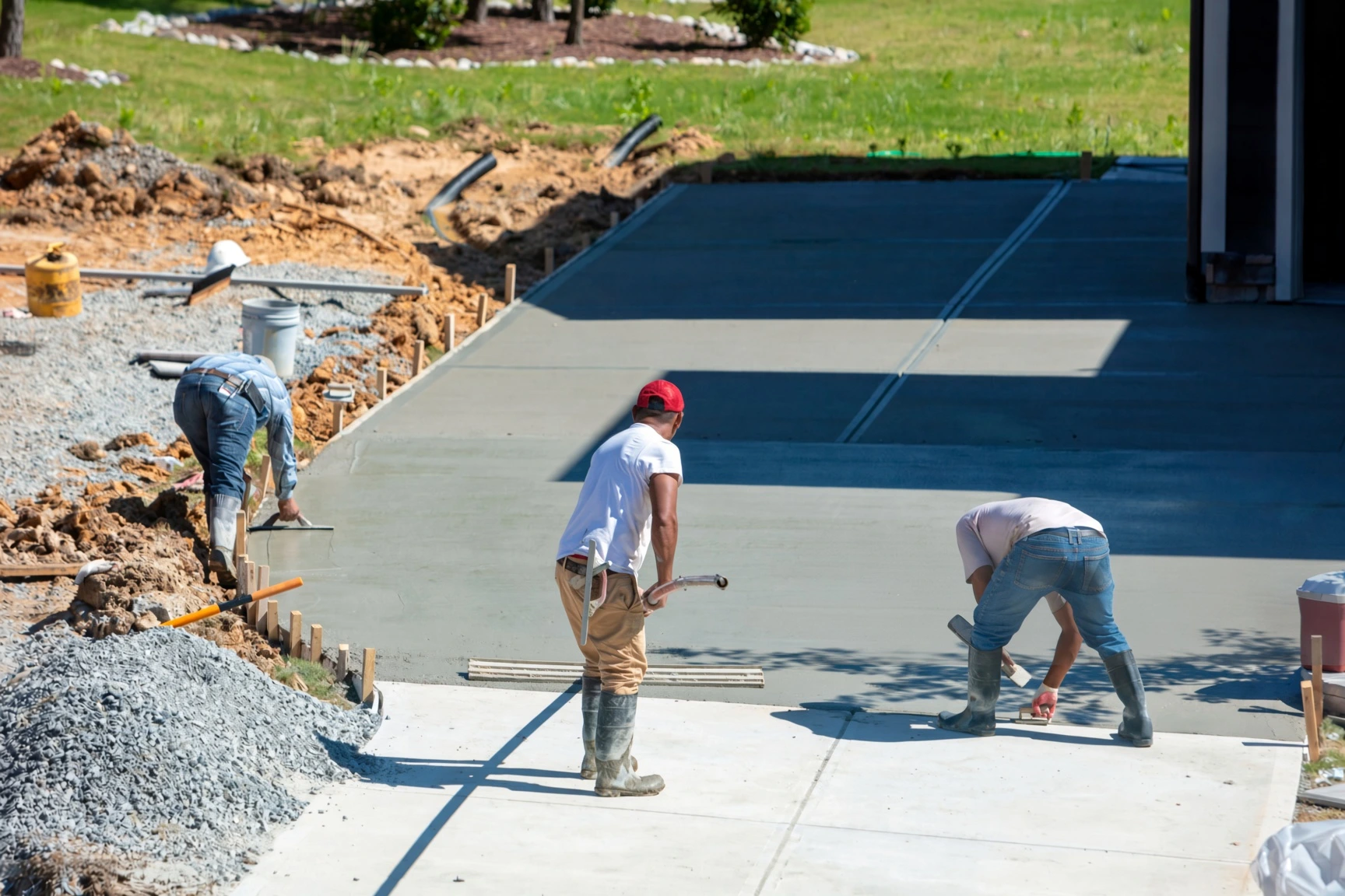 Concrete driveway widening and parking pad added in Plano